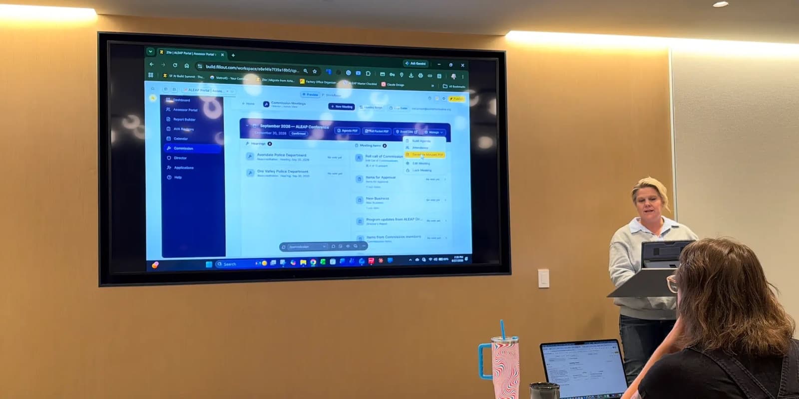 Stacy Olson demoing the ALEAP accreditation portal, showing a commission meeting with hearings and agenda items
